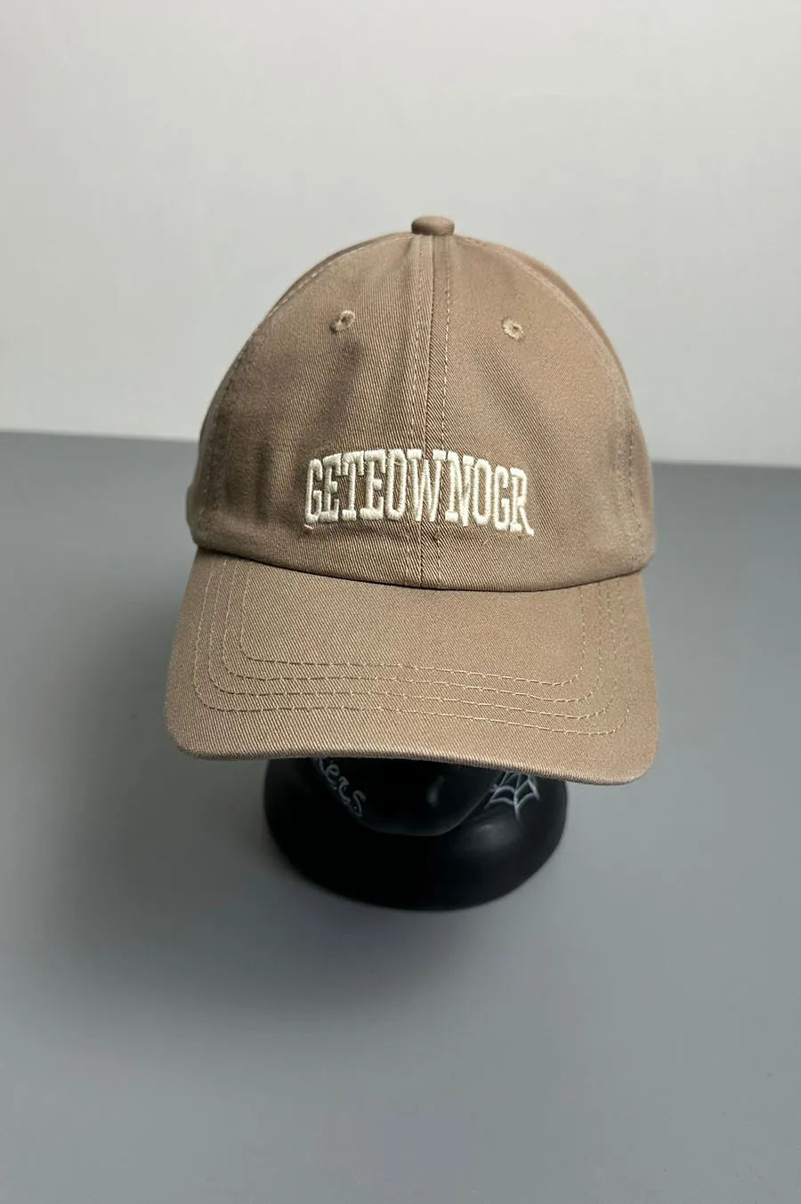 T. Beige